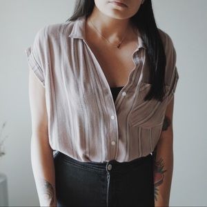 Sleeveless button up blouse